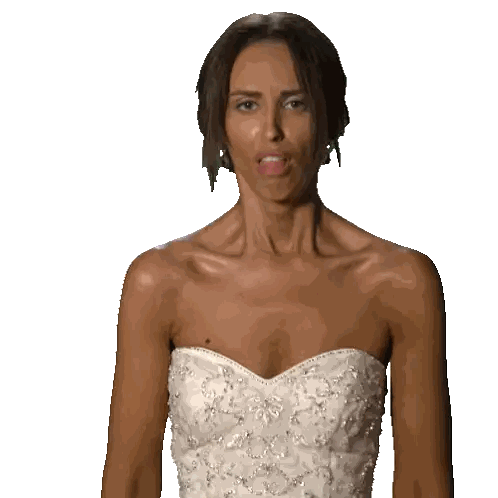A Woman In A White Strapless Dress Is Making A Face Sticker
