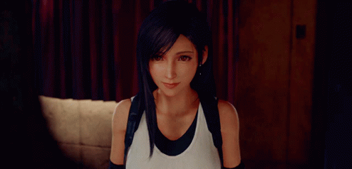 A Woman In A White Tank Top And Black Gloves Looks At The Camera GIF