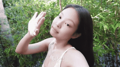 A Woman In A White Tank Top Is Covering Her Face With Her Hand And The Words Bye Written On The Bottom GIF
