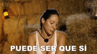 A Woman In A White Tank Top Says " Puede Ser Que Si " In Spanish GIF