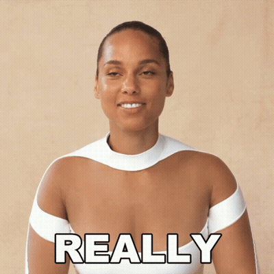 A Woman In A White Top Has The Word Really Written On Her Chest GIF