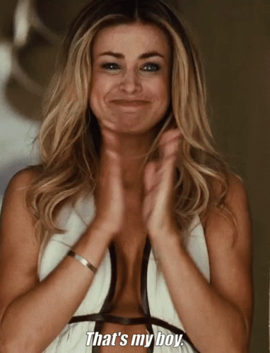 A Woman In A White Top Is Clapping Her Hands And Says That 'S My Boy GIF
