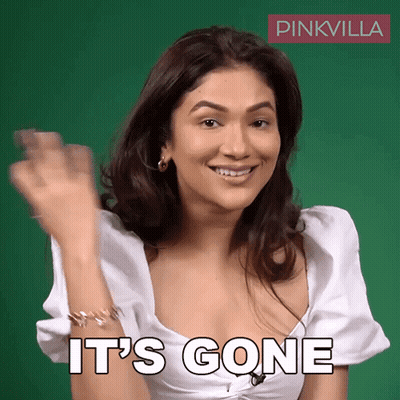 A Woman In A White Top Says It 'S Gone In Front Of A Green Background GIF