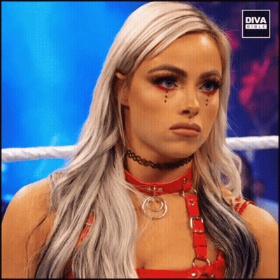 A Woman In A Wrestling Ring With The Diva Girls Logo GIF