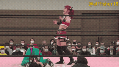 A Woman In A Wrestling Ring With The Hashtag Alfisher18 GIF
