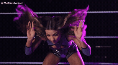 A Woman In A Wrestling Ring With The Hashtag Thekamdreesen On The Bottom GIF
