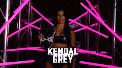 A Woman In A Wrestling Ring With The Name Kendal Grey On The Bottom GIF
