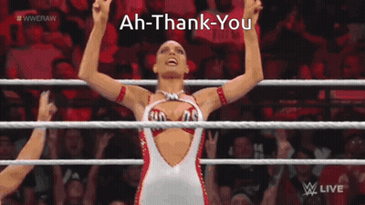 A Woman In A Wrestling Ring With The Words Ah-Thank-You Written Above Her GIF