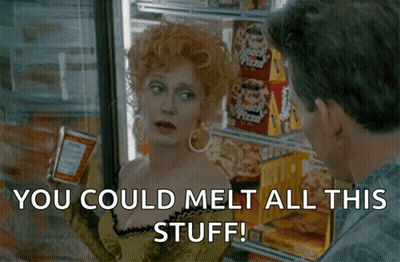 A Woman In A Yellow Dress Is Holding A Can Of Sauce And A Man Says You Could Melt All This Stuff .. GIF