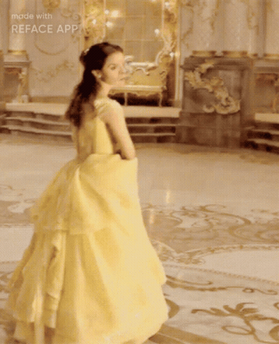 A Woman In A Yellow Dress Is Standing In A Room With The Words Made With Reface App On The Bottom GIF