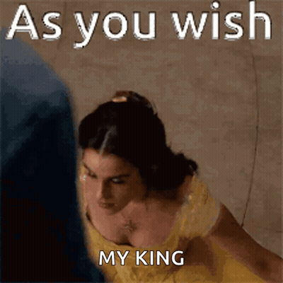 A Woman In A Yellow Dress With The Words As You Wish My King GIF