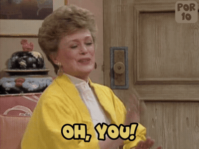 A Woman In A Yellow Jacket Is Clapping And Saying Oh You GIF