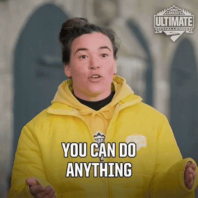 A Woman In A Yellow Jacket With The Words You Can Do Anything On It GIF