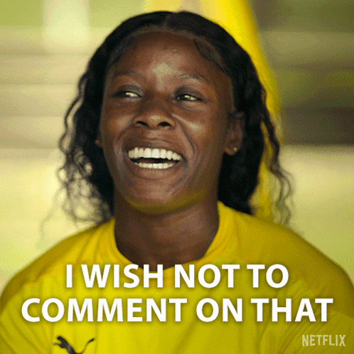A Woman In A Yellow Shirt Is Laughing And Says I Wish Not To Comment On That GIF