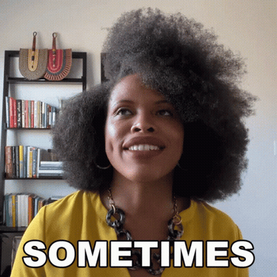 A Woman In A Yellow Shirt Is Smiling With The Words Sometimes Above Her GIF