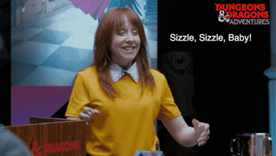A Woman In A Yellow Shirt Stands In Front Of A Sign That Says Dungeons & Dragons GIF
