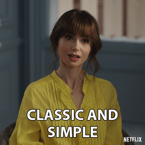 A Woman In A Yellow Shirt With The Words Classic And Simple On The Bottom GIF