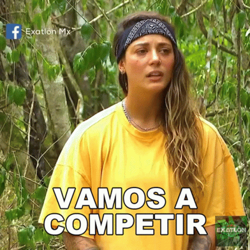 A Woman In A Yellow Shirt With The Words Vamos A Competir Written On It GIF