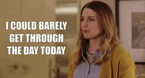 A Woman In A Yellow Sweater Says I Could Barely Get Through The Day Today GIF