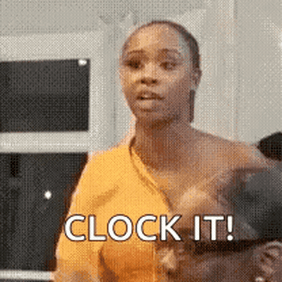 a woman in a yellow top is standing next to a man and says `` clock it '' .