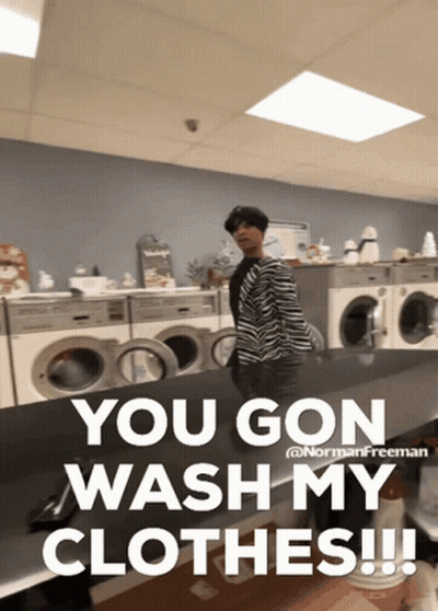 A Woman In A Zebra Print Jacket Stands In A Laundromat With The Words You Gon Wash My Clothes GIF
