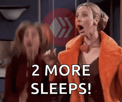 A Woman In An Orange Coat Is Screaming With The Words " 2 More Sleeps " Below Her GIF