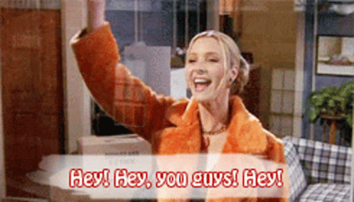A Woman In An Orange Fur Coat Says Hey Hey You Guys GIF