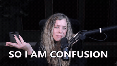 A Woman In Front Of A Microphone With The Words So I Am Confusion Below Her GIF