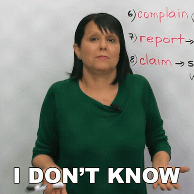 A Woman In Front Of A White Board Says I Don T Know GIF