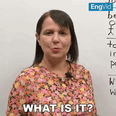 A Woman In Front Of A White Board Says " What Is It " GIF