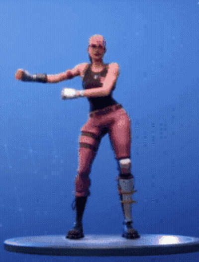A Woman In Pink Pants And A Black Tank Top Is Dancing On A Platform . GIF