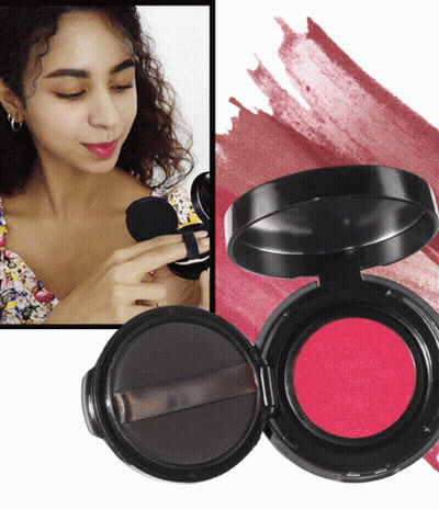 A Woman Is Applying Lipstick To Her Lips Next To A Container Of Lipstick GIF