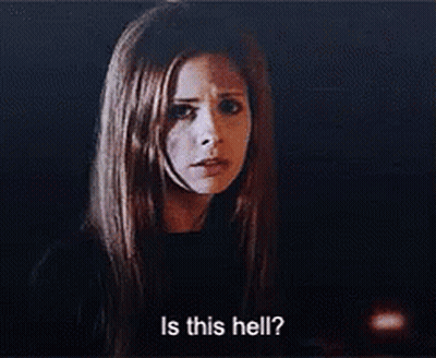 A Woman Is Asking Is This Hell ? In A Dark Room . GIF