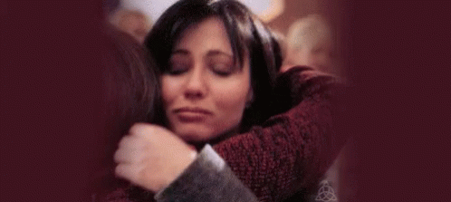 A Woman Is Being Touched By A Man 'S Hand In A Blurry Photo . GIF