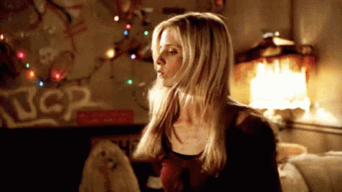 Woman Blowing Kiss In UCR Room GIF
