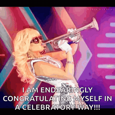 A Woman Is Blowing A Trumpet And Says I Am Endearingly Congratulating Myself In A Celebratory Way GIF