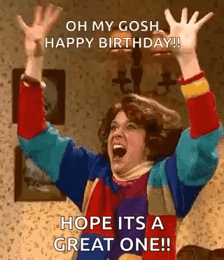 A Woman Is Celebrating Her Birthday With Her Arms In The Air And Says `` Oh My Gosh , Happy Birthday ! `` GIF