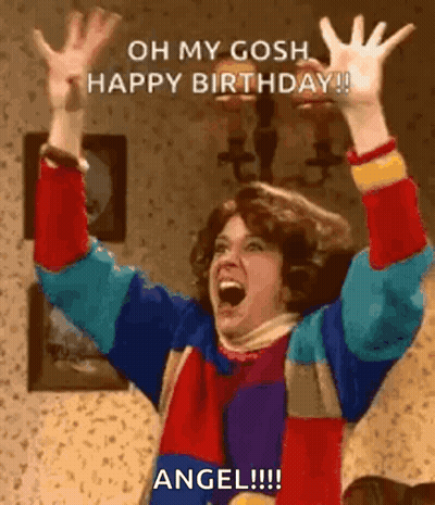 A Woman Is Celebrating Her Birthday With Her Arms In The Air And Screaming . GIF
