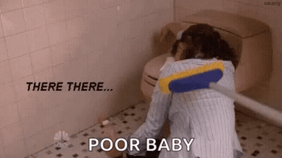 A Woman Is Cleaning A Bathroom Floor With A Broom And Says `` Poor Baby '' . GIF
