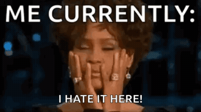 A Woman Is Covering Her Face With Her Hands And The Words `` Me Currently , I Hate It Here '' . GIF
