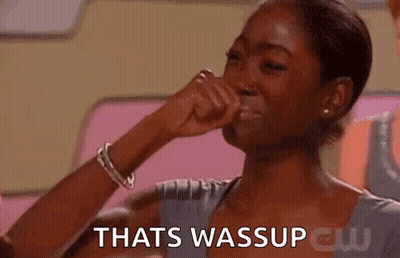 A Woman Is Covering Her Nose With Her Hand While Crying . GIF