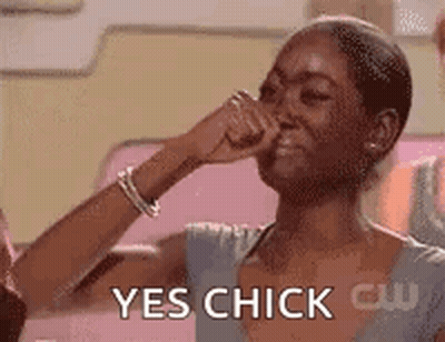 A Woman Is Covering Her Nose With Her Hand While Saying Yes Chick . GIF