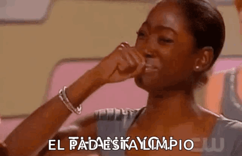 A Woman Is Crying And Covering Her Face With Her Hand While Saying El Padaesitay Limpio . GIF