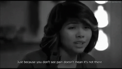 A Woman Is Crying In A Black And White Photo With A Quote That Says Just Because You Don 'T See Pain GIF