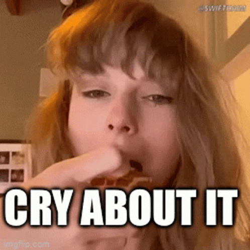 A Woman Is Crying While Eating A Piece Of Pizza With The Caption Cry About It GIF
