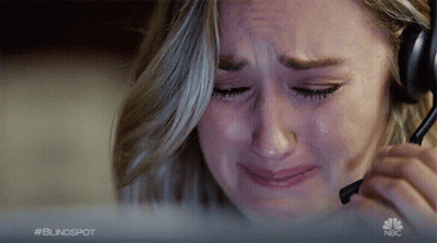 A Woman Is Crying While Wearing A Headset And The Nbc Logo Is Visible Behind Her GIF
