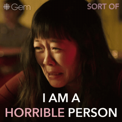 A Woman Is Crying With The Words I Am A Horrible Person Behind Her GIF