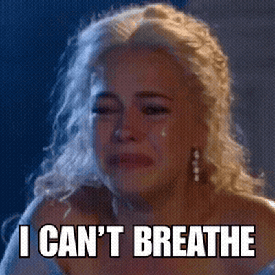 A Woman Is Crying With The Words `` I Can 'T Breathe '' On Her Face . GIF