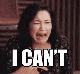 A Woman Is Crying With The Words `` I Can 'T '' On Her Face . GIF
