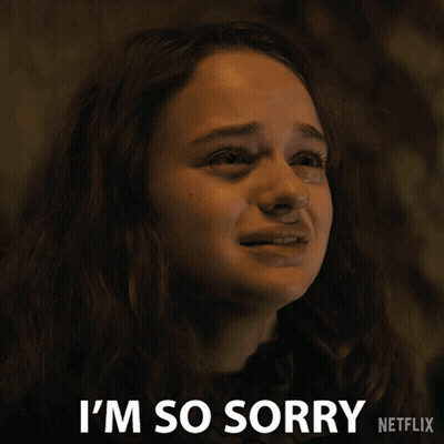 A Woman Is Crying With The Words I 'M So Sorry Behind Her GIF